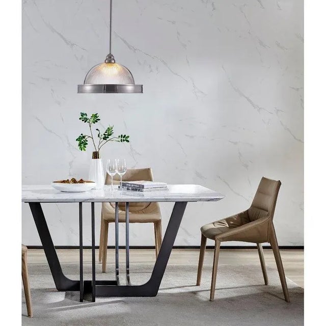 The Natalie pendant features a rounded glass shade resting gracefully atop a polished chrome base. Part of our Bliss...