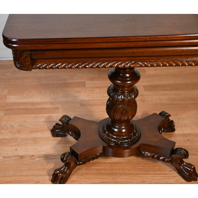 We are pleased to offer this gorgeous Antique American Empire game table/ console table, from the 1910s. This table is...