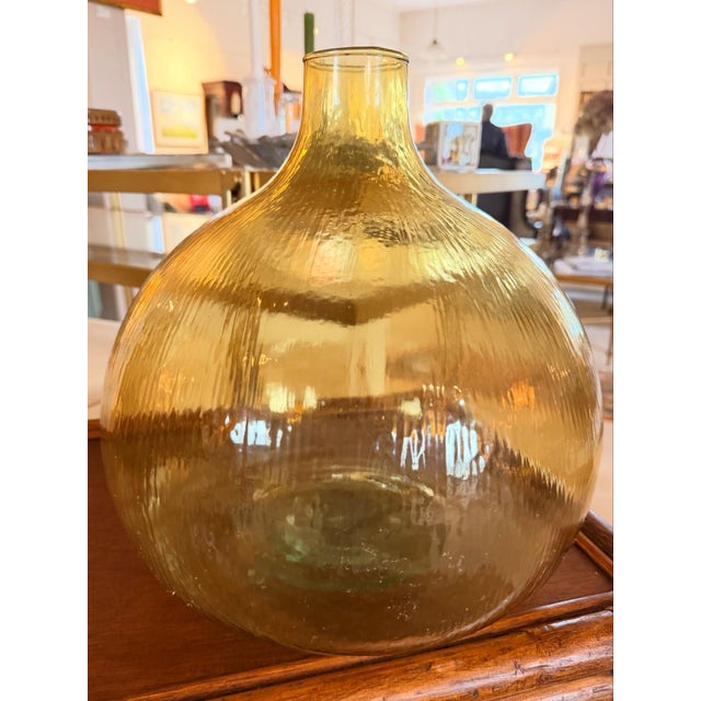 Fabulous mid century pale yellow thin glass bottle/vase. Has a great modern look!