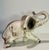 Vintage ceramic elephant with a raised trunk (for good luck!) and hand painted gray and black shading. This folk art...