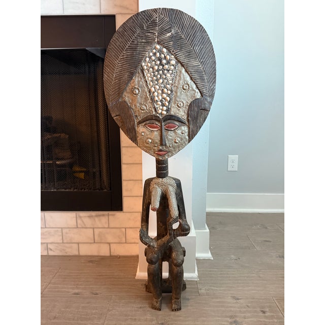 An exceptionally rare and commanding pair of monumental West African figural sculptures, each standing nearly 3 1/2 feet...