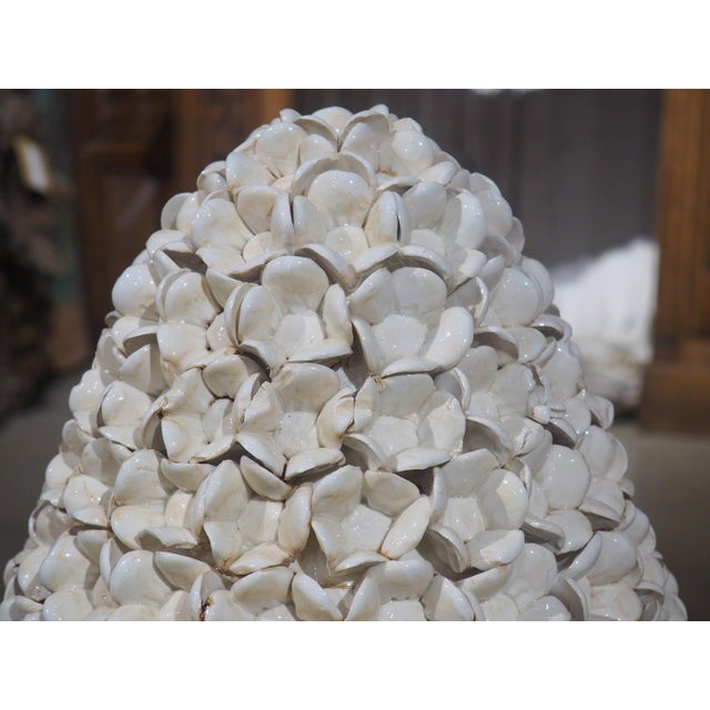 More information coming soon… A stunning pair of creamware topiaries, measuring 28 inches tall. From Italy, the topiaries...