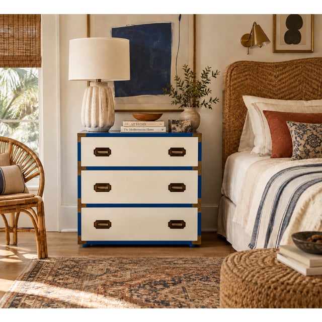 There's a chic quality to vintage campaign chests and dressers that never quite goes out of style — the clean rectilinear...