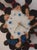 Handcrafted artistic wall clock created from natural wood slices, mineral crystals, decorative rope, and textured crystal...
