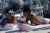 Slim Aarons, Sunbathing in Antibes, Estate Stamped Photographic Print, 1976 / 2020s For Sale