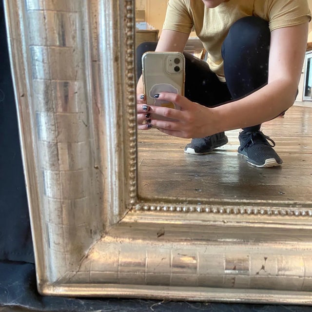 Silver leaf antique Louis Philippe mirror having a lovely striped pattern with beaded edge and curved top. Original pine...