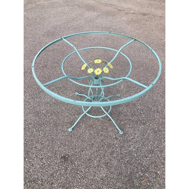 Beautiful Daisy pattern table and matching 4 chairs, marked on the chairs Lee L. Woodard and Sons. Comes with four...