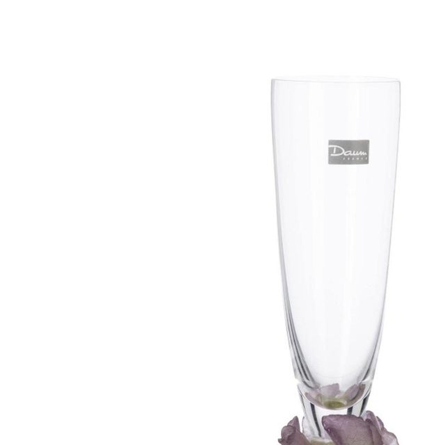 Glass and Crystal - Two Daum Roses flutes. French; 20th century in crystal with molded and embossed paste base; acid-...