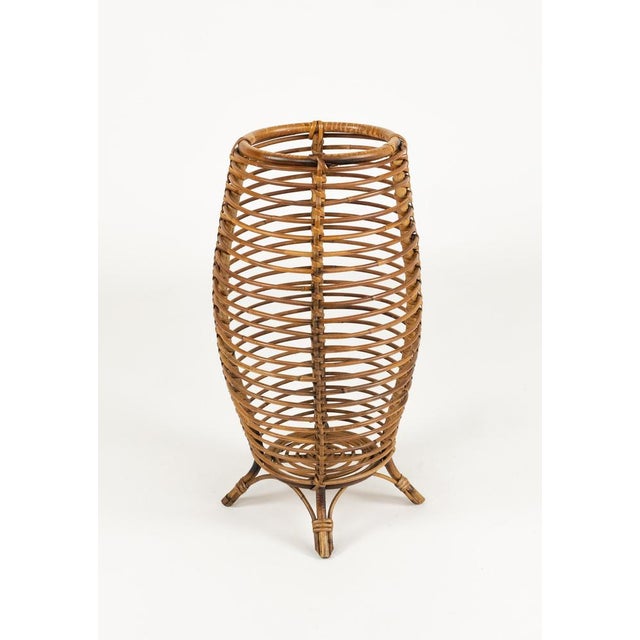 Midcentury wonderful umbrella stand or basket in curved rattan and bamboo in the style of Franco Albini, Made in Italy in...