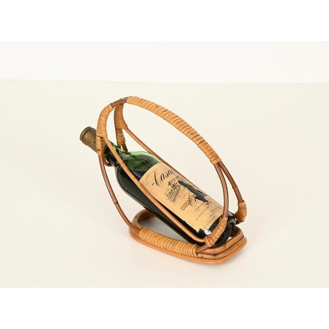 Wonderful Mid-Century organic decorative bottle holder or display stand, entirely hand-crafted from curved rattan and...