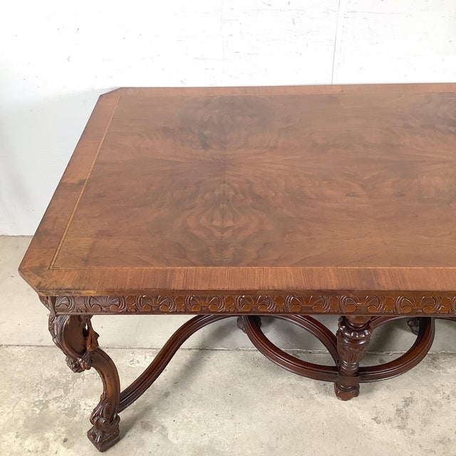 This 72-inch carved dining table reflects the enduring influence of Renaissance Revival design, blending architectural...