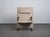 Designed by burkhard vogtherr for arflex in 1985, the t-line lounge chair combines a distinctive architectural silhouette...