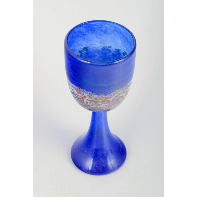 Kjell Engmann for Kosta Boda Art glass, 1980s. Signed art glass goblet in intense cobalt blue with a decorative band of...
