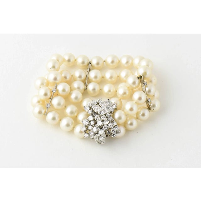 Perfect piece to wear with a gown or a suit, this impressive cultured pearl bracelet has three strand of pearls ranging...