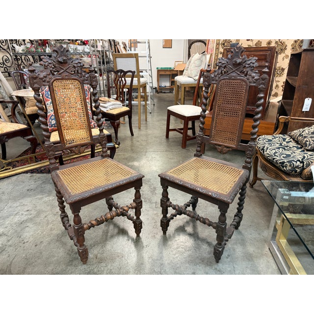 Set of six 19th-century French Renaissance Revival dining chairs, masterfully hand-carved from solid walnut. Rooted in the...