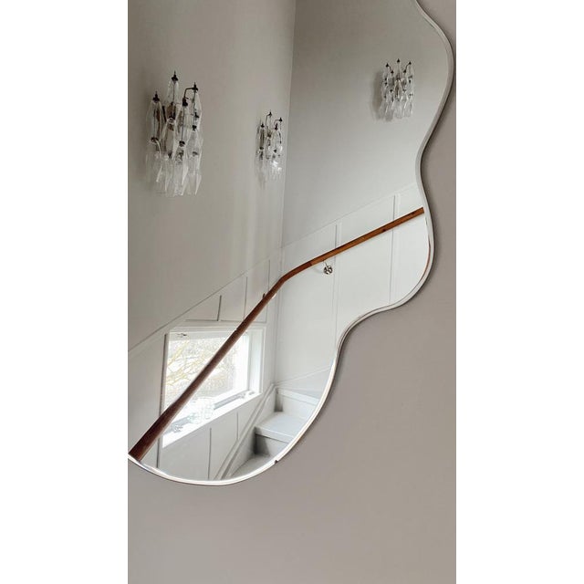 Murano Wall Lamp consisting of sixteen handmade crystal prisms with finishes and fittings painted in gold. Glass from the...