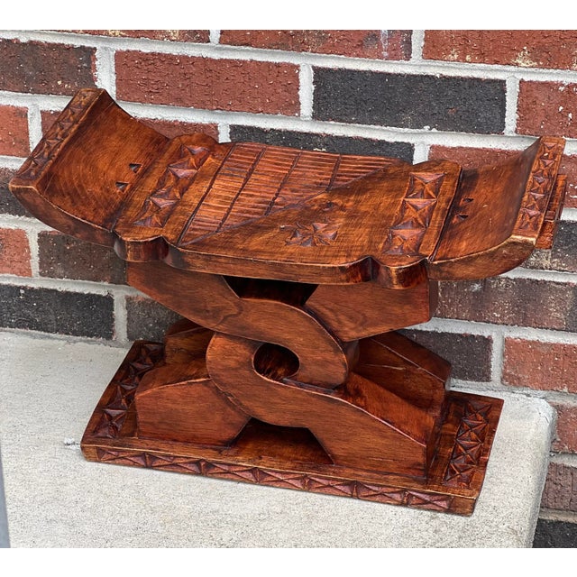 Vintage Ashanti cedar ‘Wisdom Knot’ stool, handcrafted in Ghana. The stool is intricately carved from a single piece of...
