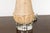 A pair of English Midcentury pine table lamps with natural finish, mounted on circular lucite bases. Illuminate your...