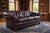 This striking vintage leather sofa beautifully captures the timeless sophistication of classic English Club design....
