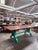 Vintage industrial custom table, featuring a true vintage Hure machinist base, newly lacquered in vibrant green, and a...