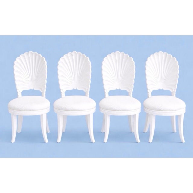An exceptional coastal dining set that embodies refined Palm Beach elegance, this five-piece collection features a...