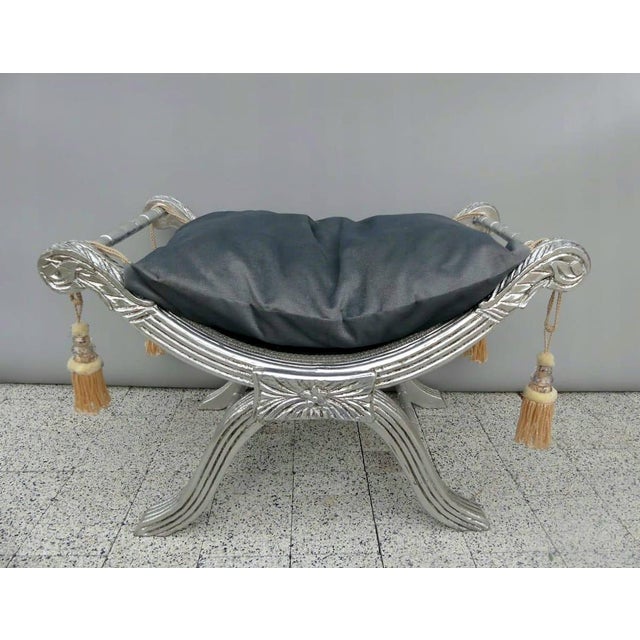 Bring timeless elegance to your home with this exquisite French-style vanity bench, handcrafted from solid wood and...