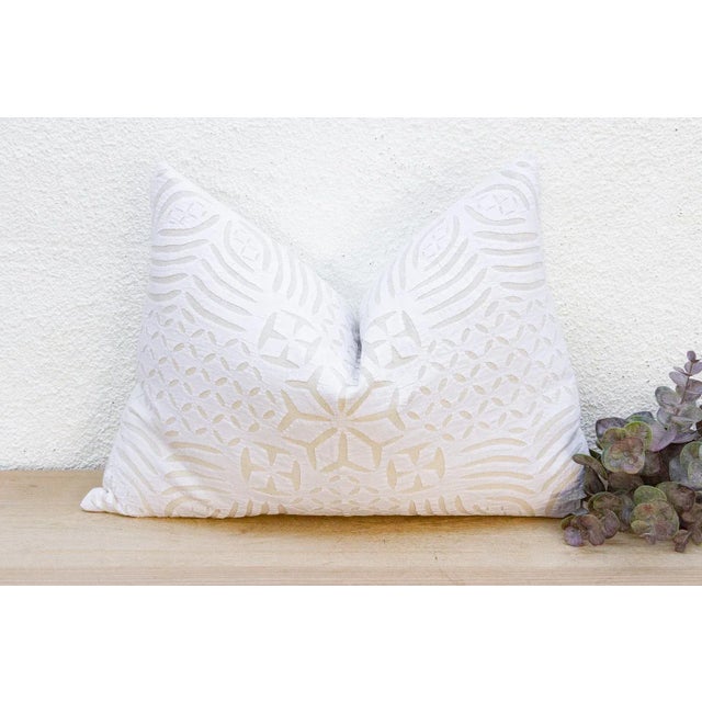 This decorative pillow cover features beautiful array of patterns, with hand crafted appliqué cut work, giving it a...