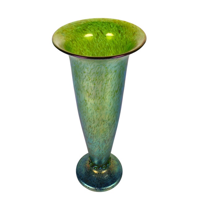 A spectacular large Loetz Austria studio art glass vase, showcasing the exceptional craftsmanship and luminous iridescent...