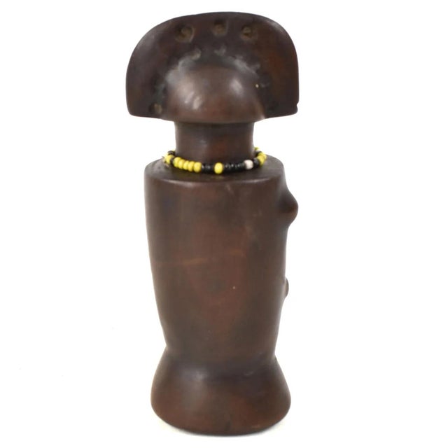 Discover Nyamwezi Miniature Wood Figures, a captivating art form hailing from Tanzania. Crafted with precision and care,...