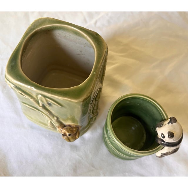 Two vintage Asian ceramic planters/catchalls with green bamboo motifs. The larger includes a frog while the smaller...