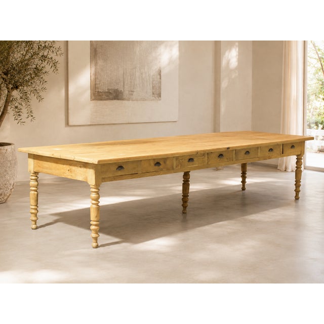 An xxl trimmings table dating from the 1950s, sourced from a trimmings factory in lyon. Crafted from solid oak, this table...