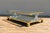 Striking Hollywood Regency two-tier coffee table, circa 1970s, in the style of Charles Hollis Jones. Features a polished...