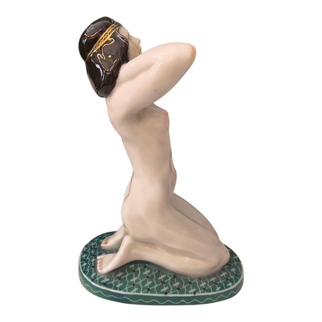 The object is a porcelain piece by Karl Ens Volkstedt, identifiable by the stamped company mark. The base shows a green...