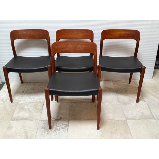 Design Plus Gallery presents a Set of Four Model 75 Side Chairs by Niels Otto Møller for J.L. Møllers Møbelfabrik. Each...