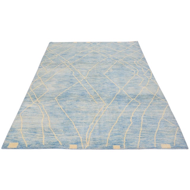 Vintage Moroccan Azilal hand knotted rug with natural colors, soft texture and fine weave.