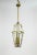 An elegantly decorative six panel, 3-light glass and brass lantern. French origin - Belle Epoque style. Each glass panel...