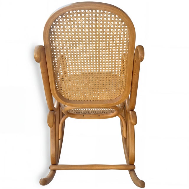 Unique Rocking Chair in Fair Vintage Condition. Bring timeless European elegance into your home with this exquisite...