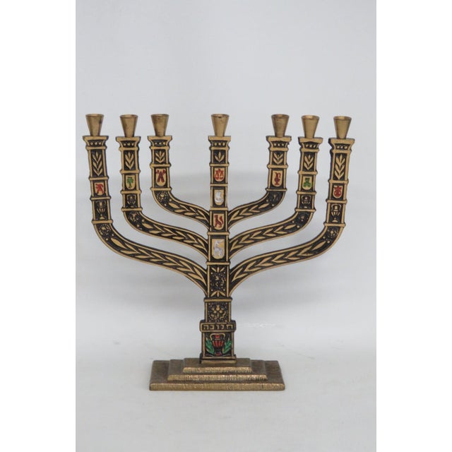 This beautiful Seven Branch Menorah is made of cast brass. This stunning vintage menorah was made in Jerusalem in the...