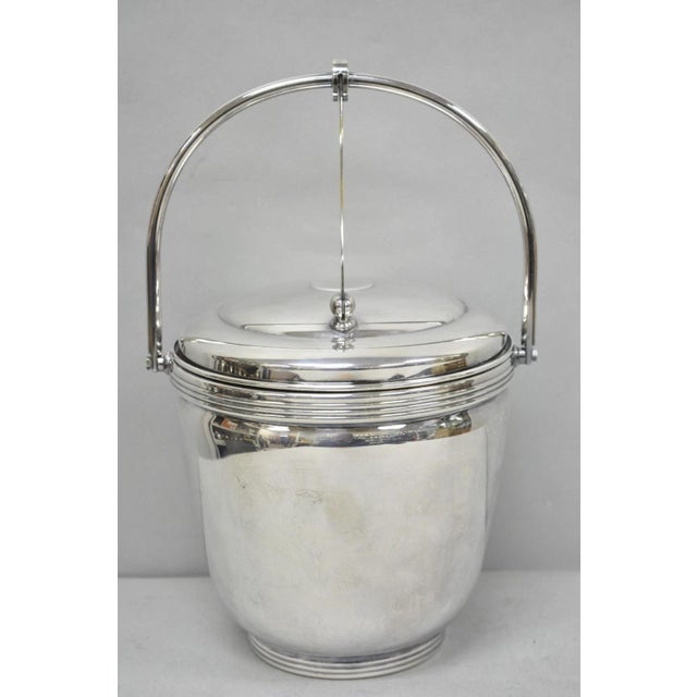 Vintage Mid Century Modern Sheffield Silver Co. Silver Plated Reticulating Hinge Ice Bucket with Tongs. Circa Mid 20th...
