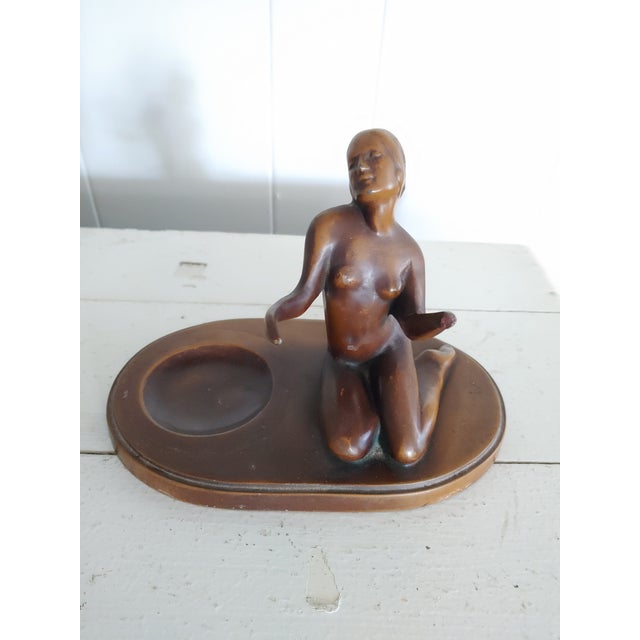 Here's a lovely Art Deco tray featuring a nude. This is spelter that has been bronzed. Could be Frankart, but it is...