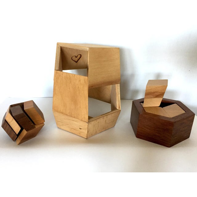 Title: Mid-century puzzle boxes. Custom made geometric wooden designs: polygon & octagon shapes. Description: 1. Larger...