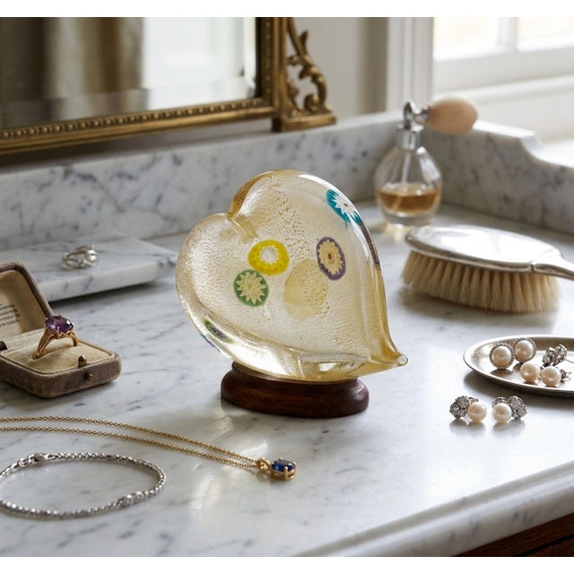 Offering a beautiful vintage hand-blown Murano glass heart with gold aventurine and colored murrines throughout, circa...