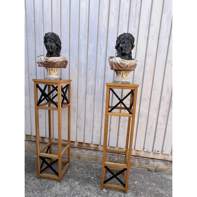 Set of 2 Mid-Century half-busts in Belgian black marble, 1930s inlaid sugar marble They depict neoclassical female...