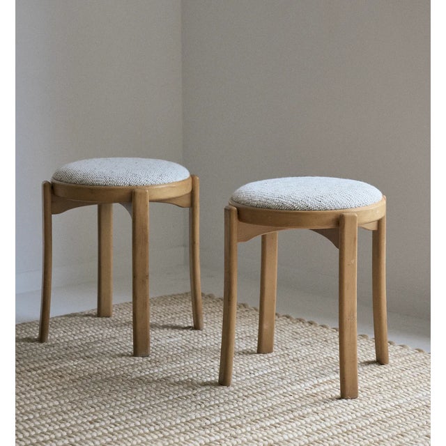 Pair of vintage Danish blonde wood stools, newly reupholstered with Cowtan & Tout fabric by Larsen. All four (4) legs of...