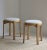 Pair of vintage Danish blonde wood stools, newly reupholstered with Cowtan & Tout fabric by Larsen. All four (4) legs of...