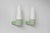 A pair of ceramic wall sconces designed by Hans-Agne Jakobsson for the Swedish company Ifö, representing a style...