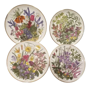 Four Floral Plates by Wedgwood