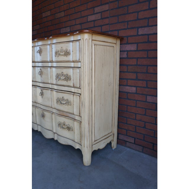 Welcome the classic ideas of French exquisiteness reminiscent of a French Chateau. This French Provincial tall dresser...