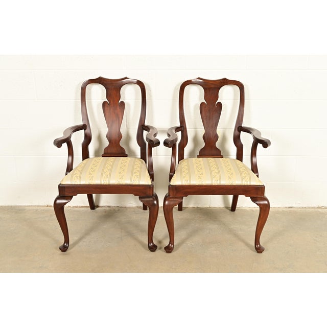 An outstanding pair of Queen Anne or Georgian style armchairs or dining captain chairs By Henkel Harris USA, Circa 1970s...