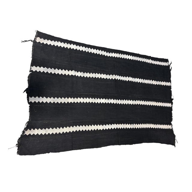 Vintage hand weaving from 100% cotton, this authentic mud-cloth textile is made by the skilled artisans of the Bamana...